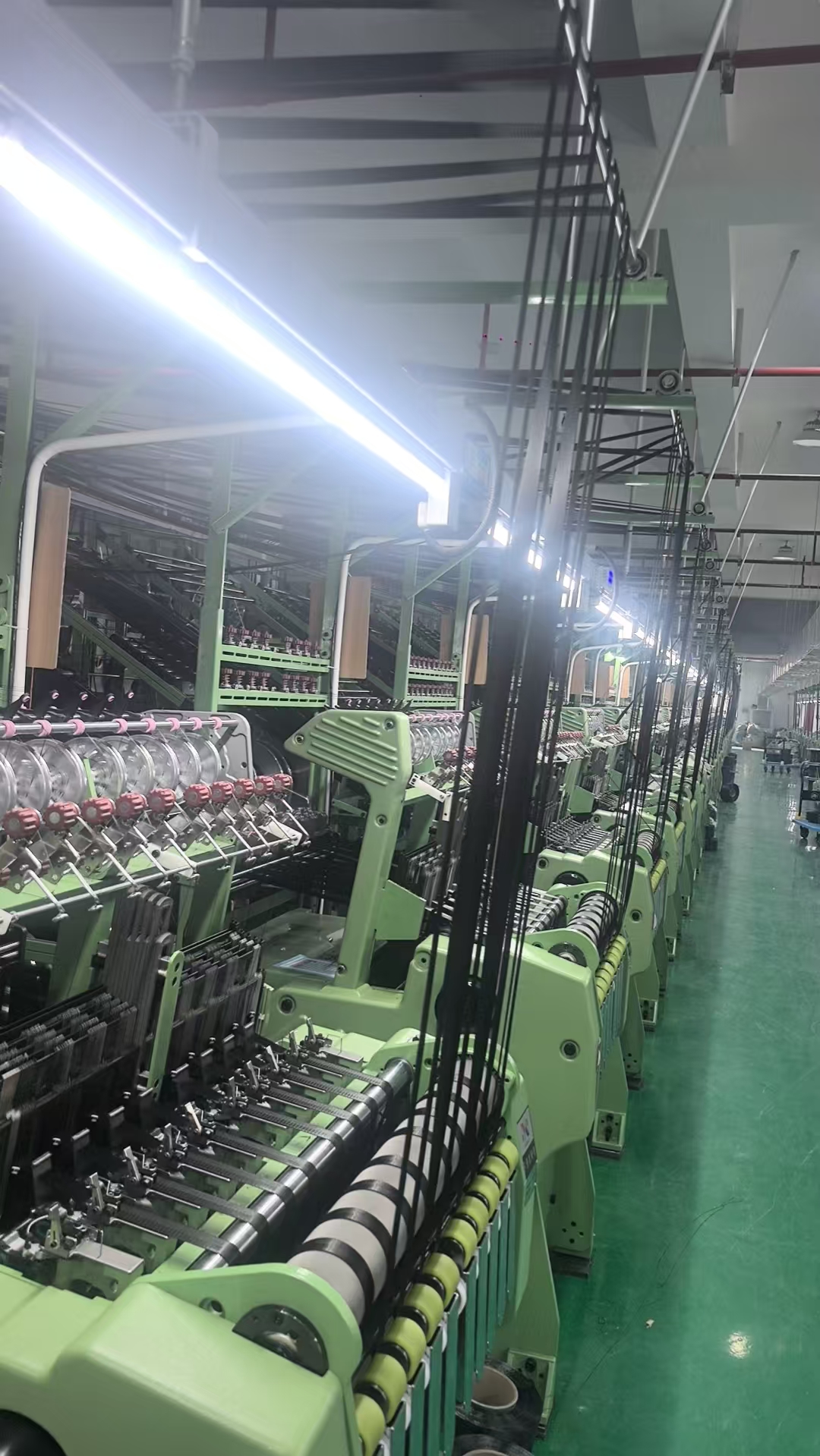 Webbing machinery under assembly at the Jinghui factory